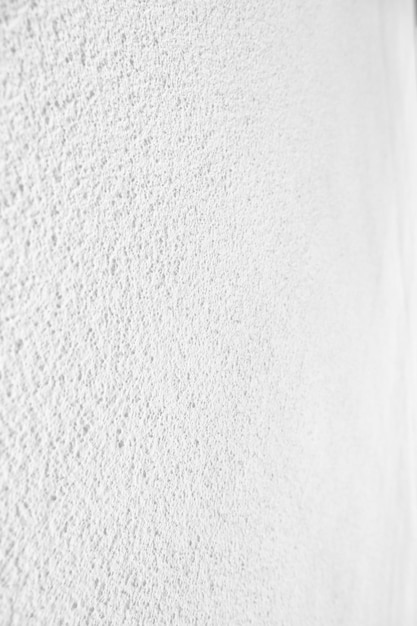 Seamless texture of white cement wall a rough surface with space for text for a background