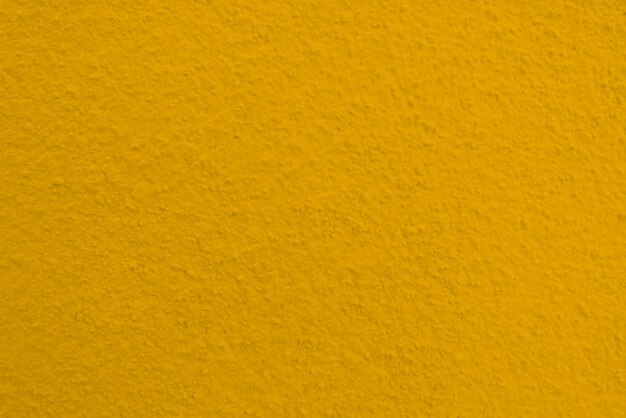 Seamless texture of yellow cement old wall a rough surface with space for text for a backgroundx9