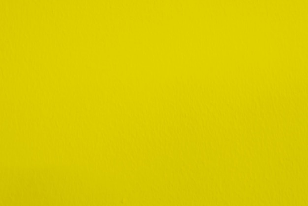 backgroundx9에 대한 텍스트를 위한 공간이 있는 거친 표면의 노란색 시멘트 벽의 매끄러운 질감