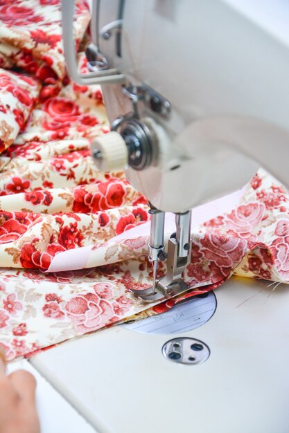 Seamstress working on sewing machine