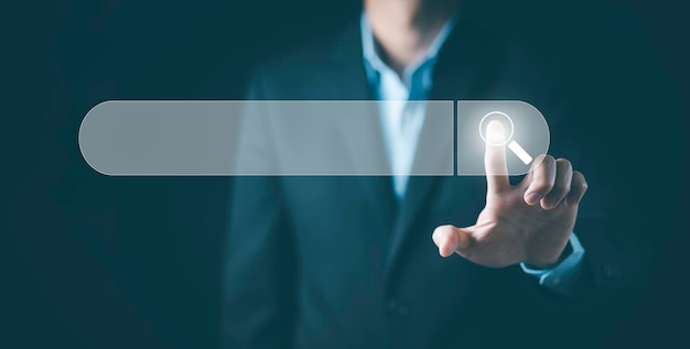 Searching browsing internet data information with blank search
bar. man's hands are using a computer keyboard to searching for
information. using search console with your website.