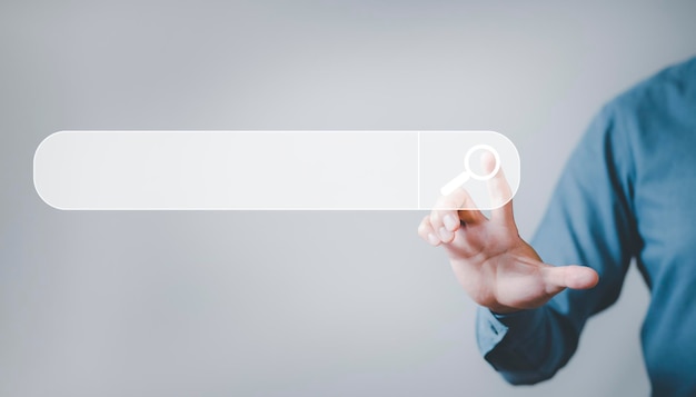 Searching Browsing Internet Data Information with blank search bar. man's hands are using a computer keyboard to Searching for information. Using Search Console with your website.