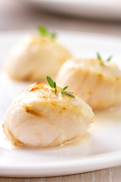 Seared Scallops on a plate High quality photo