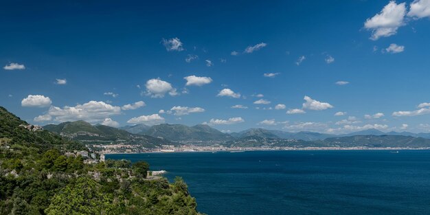 Seascape on the Amalfi Coast Province of Salerno Campania Mountains sea and blue sky with clouds Southern Italy