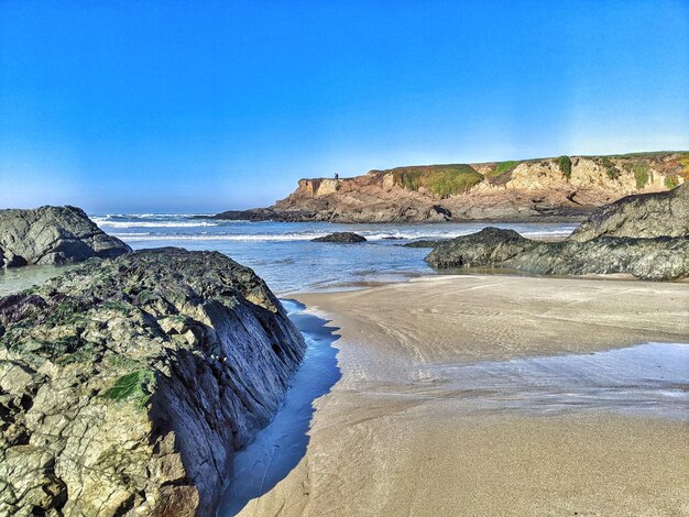 Seascape boulders bluffs and sand