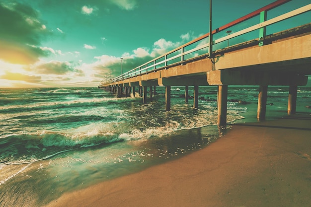 Seascape in the evening Pier and sea at sunset