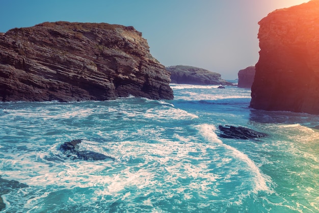 Seascape in the morning Rocky sea coast at sunrise Beach Playa de Las Catedrales in Ribadeo Galicia Spain