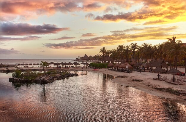 Seascape of Puerto Aventuras beach in Mexico at Dusk