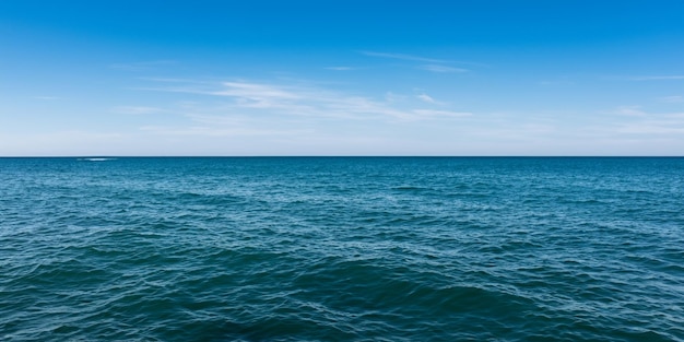 Seascape and stones in the water are washed by foaming waves