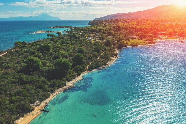 Seascape on a sunny day view from above Rocky beach with beautiful bays Vourvourou Greece Europe