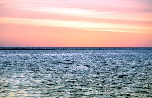 Seascape sunset on ocean and romantic moment