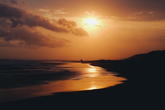 Seascape with clear sky and waves on sunset