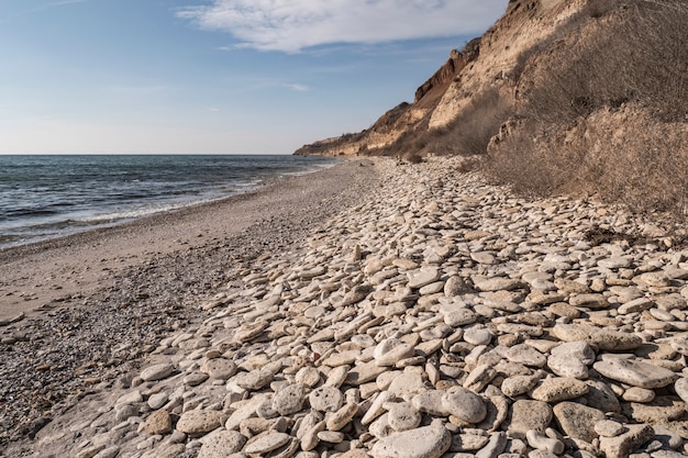 Seashore and surf on the beach, no people, secluded vacation spot