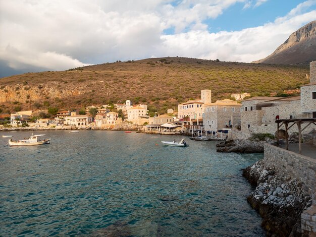 Seaside Limeni village with stone buildings in Mani Greece