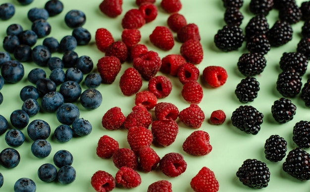 Seasonal berries on green . Healthcare and vitamins 