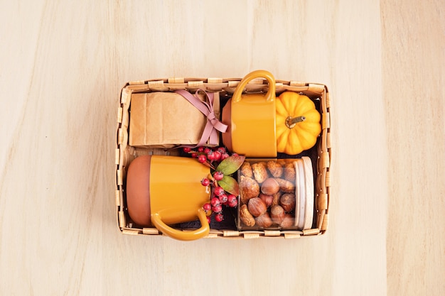 Seasonal gift box with cup, tea or coffee package with cookies