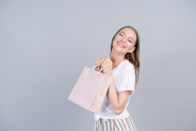 Seasonal sales and purchases Portrait adorable happy female consumer walking
