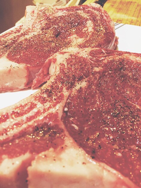 Photo seasoned rib eye steaks