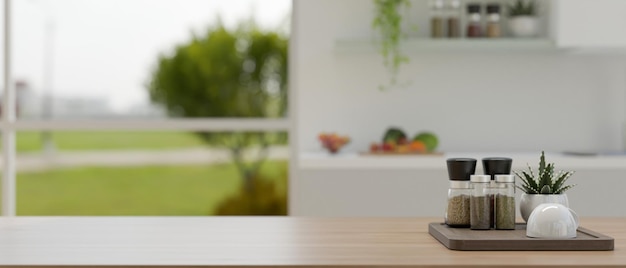 Photo a seasoning bottle tray and copy space on a hardwood table with a blurred kitchen in the background