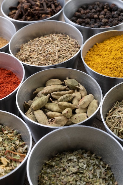 Seasonings on metallic bowls.