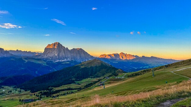 Seceda peak in italy's dolomites offers a breathtaking panorama trentino alto adige europe morning unveils the majestic furchetta peak in the alps