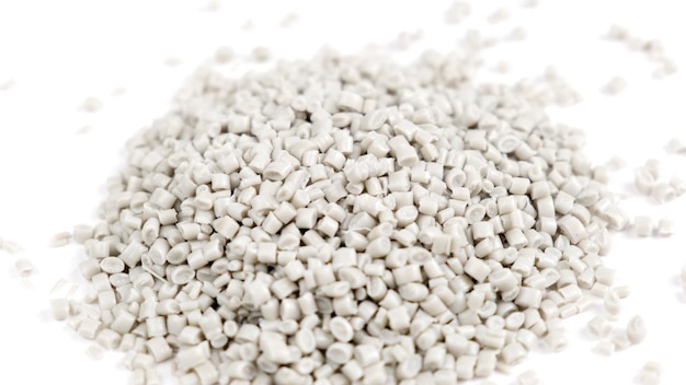 Secondary granule made of polypropylene white plastic pellets crumbles to the table plastic raw mate