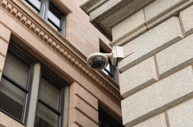 A security camera on a building