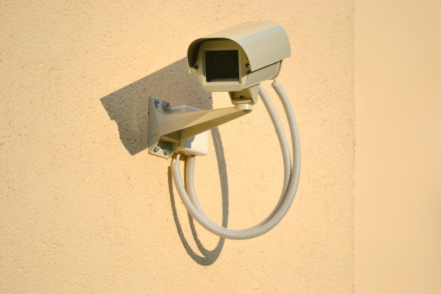 Security camera installed on a wall