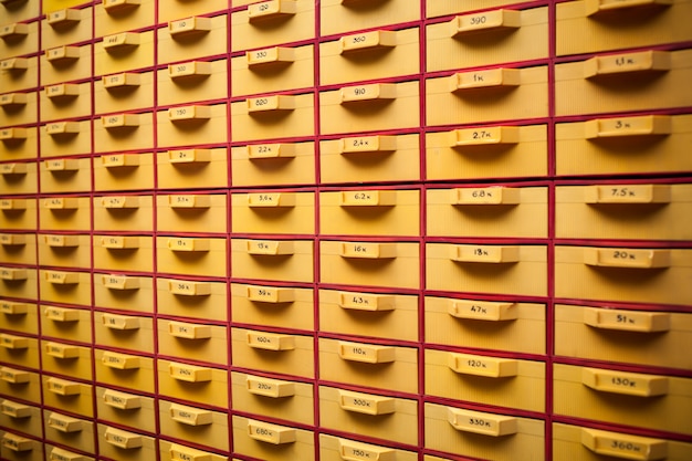 Security guard a large yellow cabinet with cells