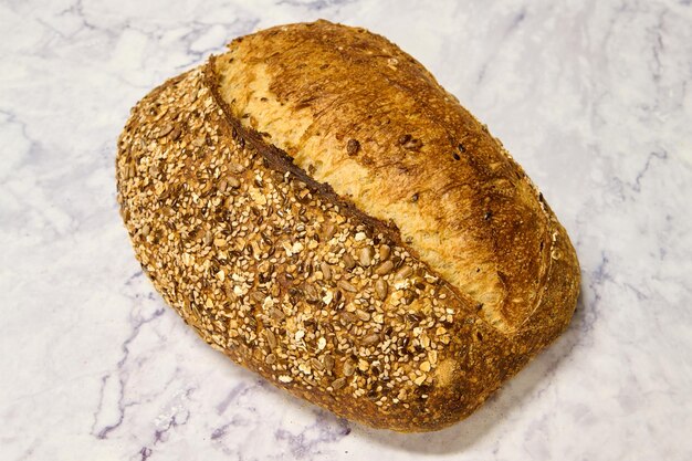 seed bread on white marble