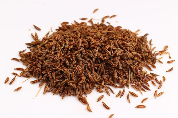 Seed cumin on a white surface