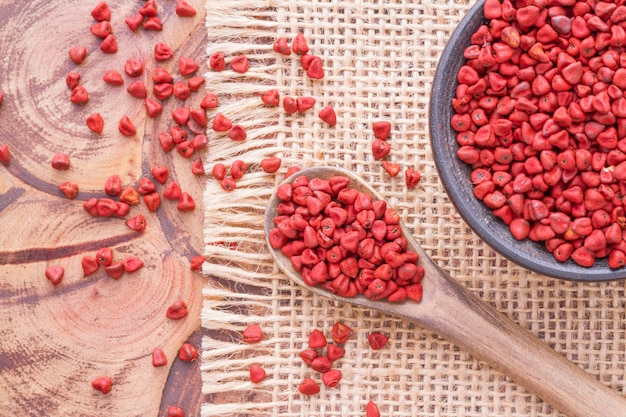 Seeds of achiote originating from central america and parts of south america is used to season food