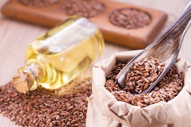 Seeds and linseed oil on the table