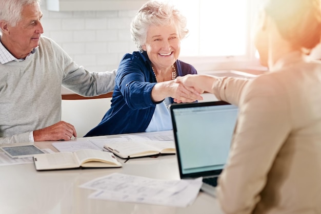 Seeking the advice they need for a secure financial future Cropped shot of a senior couple meeting with their financial consultant