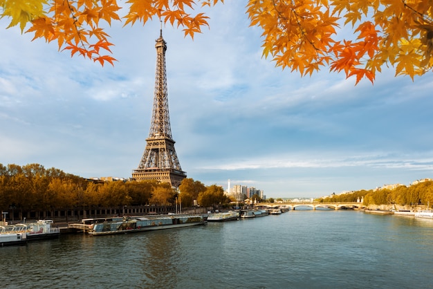 Seine in Paris with Eiffel tower in autumn season in Paris, France.