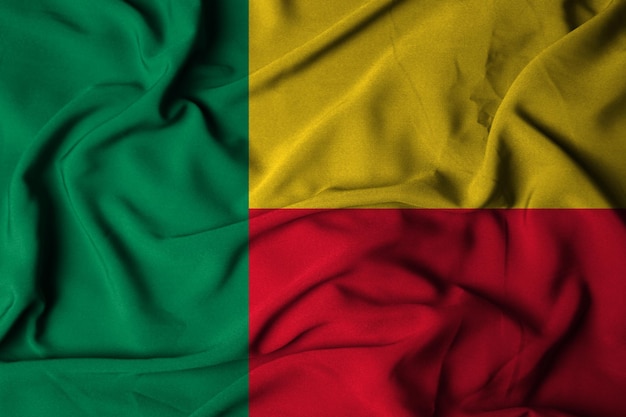 Selectieve focus van de vlag van Benin, met wuivende stoffentextuur. 3d illustratie