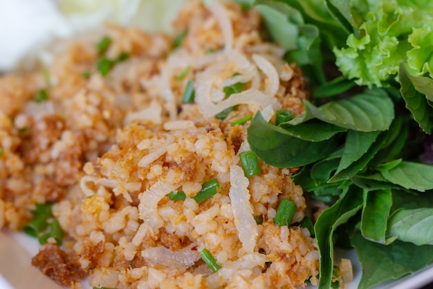 Selectieve focus Yam naaem khaao, Vietnam food, Fried Rice with pork mix