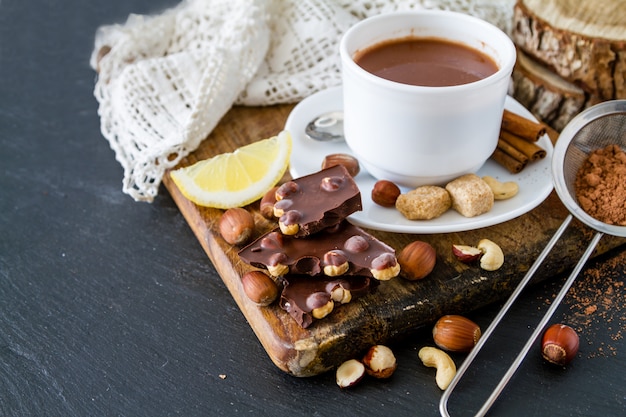 Selection of chocolate and nuts, copy space