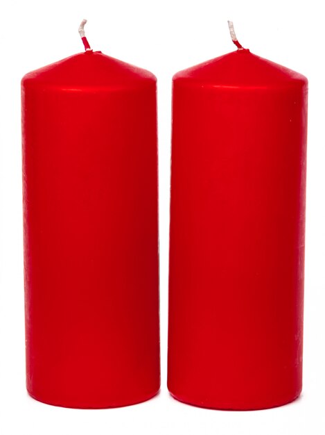 A selection of red candles on white 