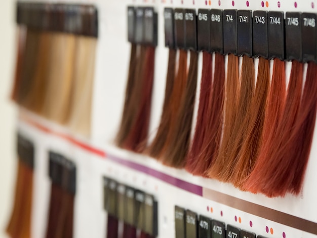 Selection of a shade of hair dye. Color of hair dyes.