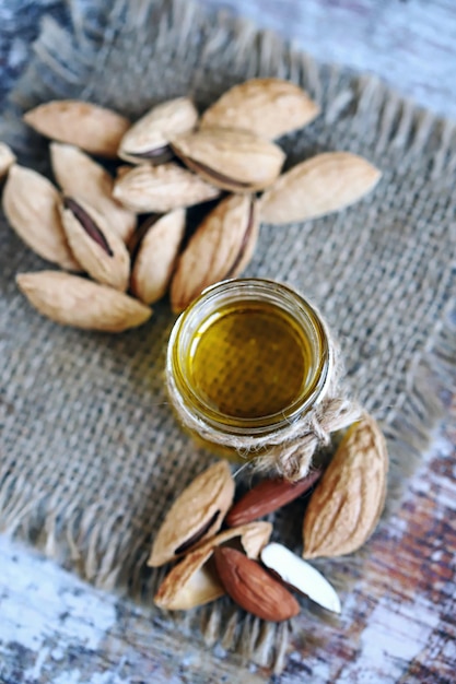 Selective focus Almonds in shells Almond oil