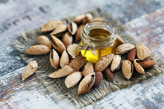 Selective focus Almonds in shells Almond oil