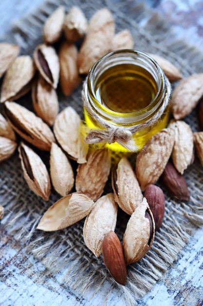 Selective focus Almonds in shells Almond oil