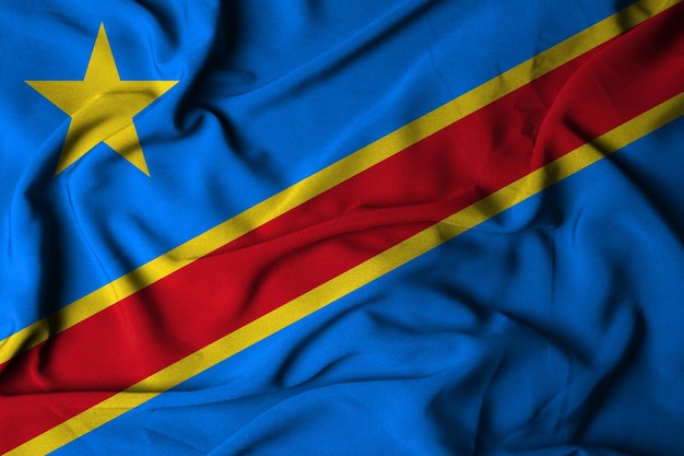 Selective focus of congo flag, with waving fabric texture. 3d illustration