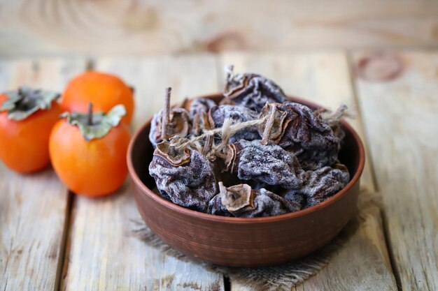 Selective focus Dried persimmon in a bowl