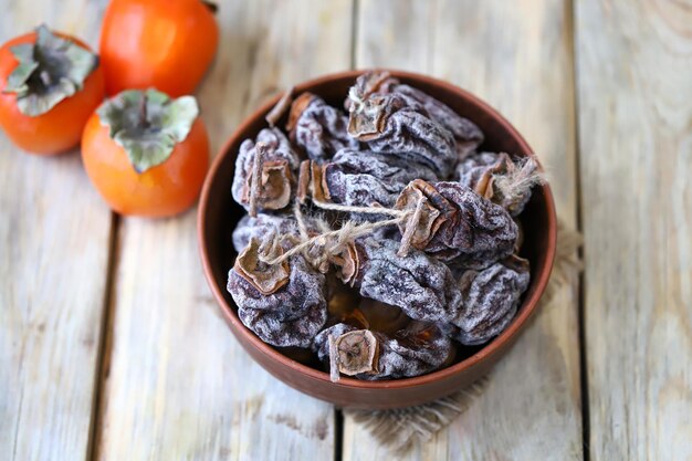 Selective focus Dried persimmon in a bowl