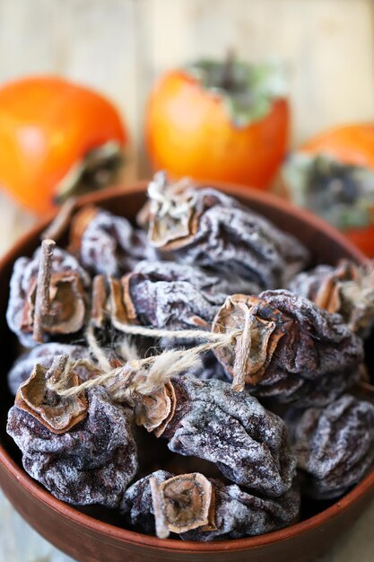 Selective focus Dried persimmon in a bowl