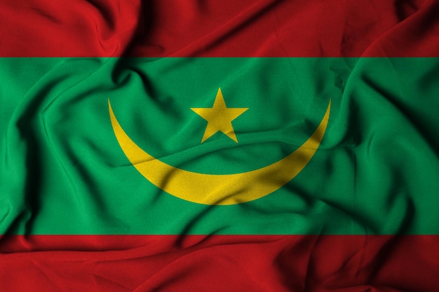 モーリタニアの旗の選択的な焦点、手を振る生地の質感。 3Dイラスト