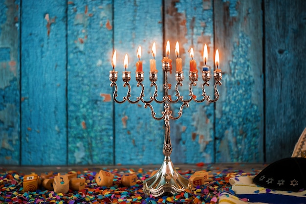 Selective focus of Hanukkah menorahs traditional candelabra in the Jewish Festival