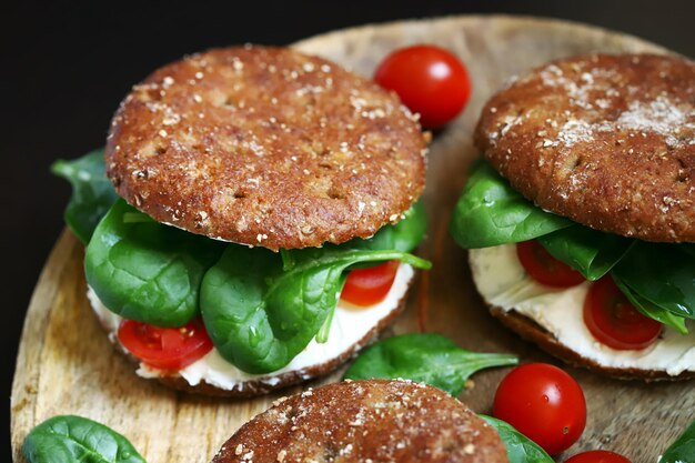 Selective focus Macro Healthy sandwiches with spinach tomatoes and Philadelphia cheese Delicious healthy food keto diet